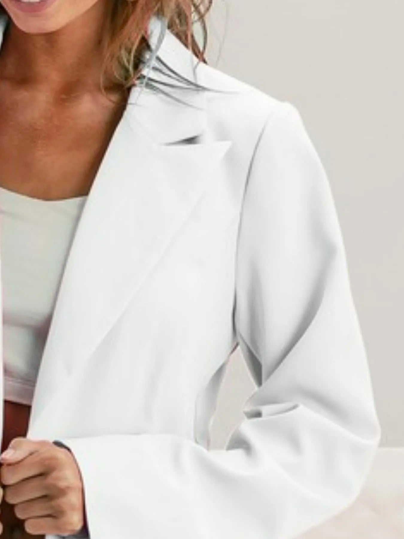 Front view of single breasted peaked lapel blazer by BiBi