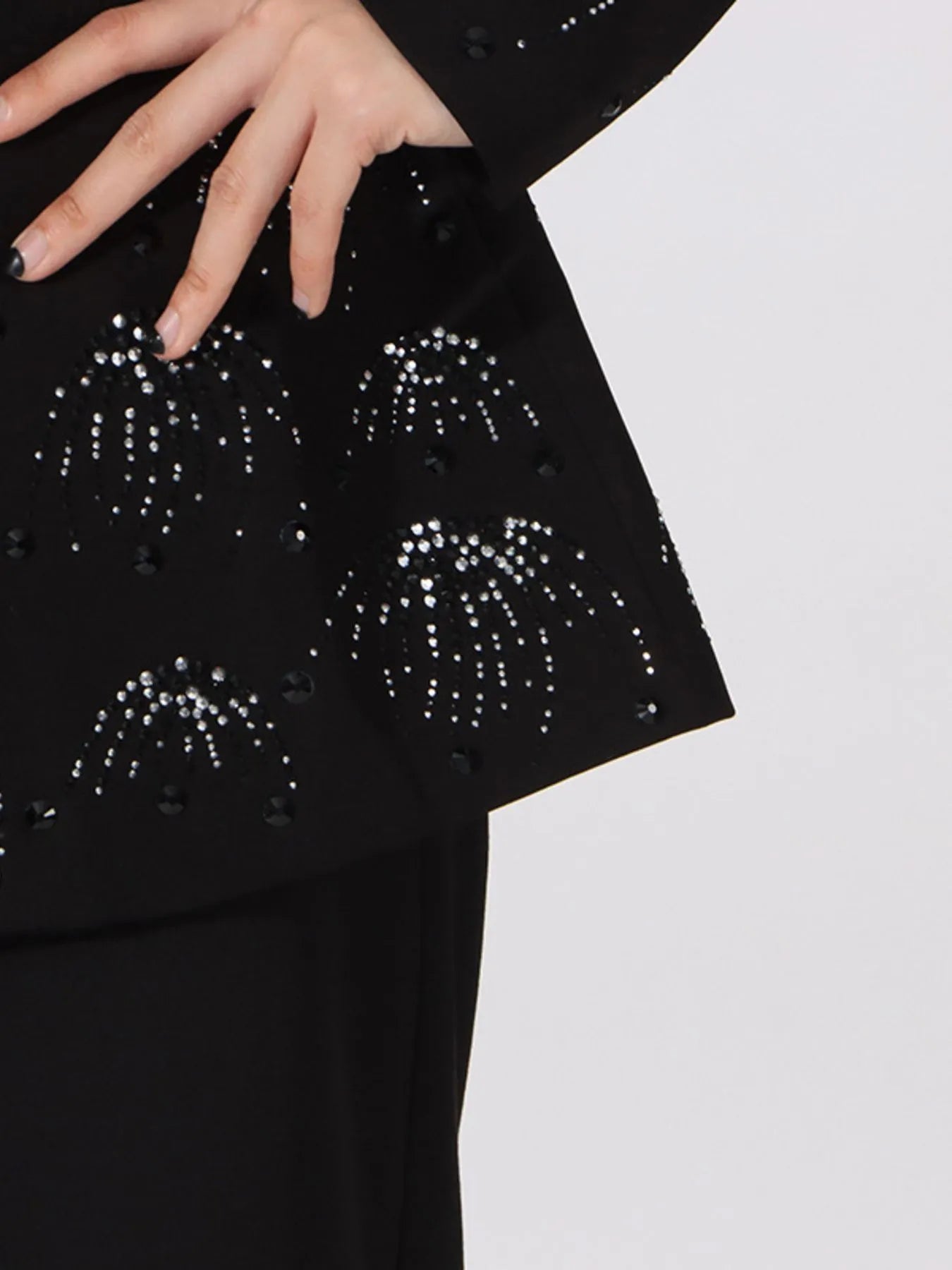 Model wearing rhinestone button down long sleeve blazer