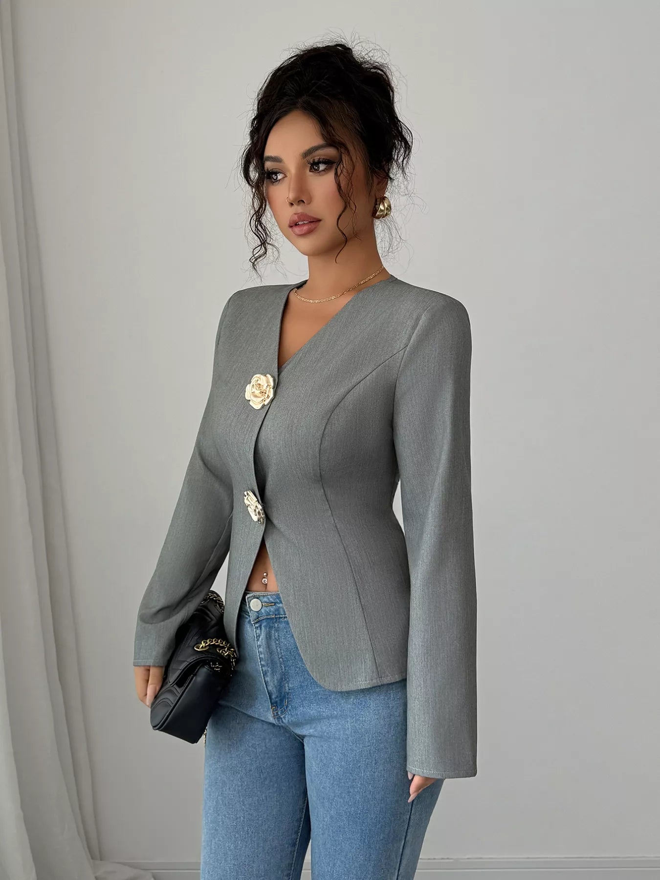 Flower button long sleeve blazer front view